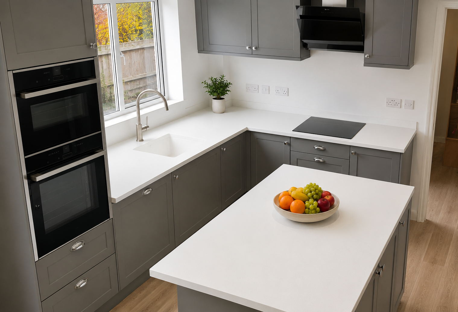 Seamless Overlay in Snow White with undermount sink, upstands and a stunning island